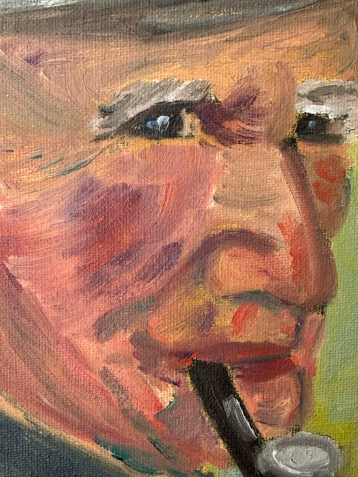 Close-up of the expressive face and colorful brushwork in a vintage portrait painting