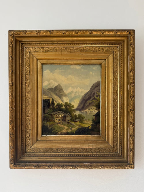 Alpine Village by J.M. Meeker, a 19th-century mountain landscape in a period gilt frame
