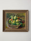 Original vintage fruit still life painting displayed in a decorative gilt frame