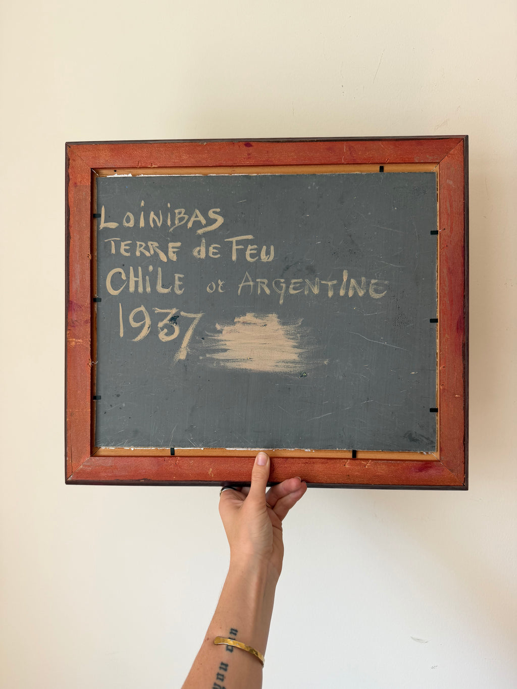 Back of 1937 Tierra del Fuego vintage oil painting with handwritten inscription reading “Loinbas Terre de Feu Chile et Argentine 1937