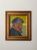 Original vintage oil portrait of a man in a cap smoking a pipe, displayed in a gilt wood frame