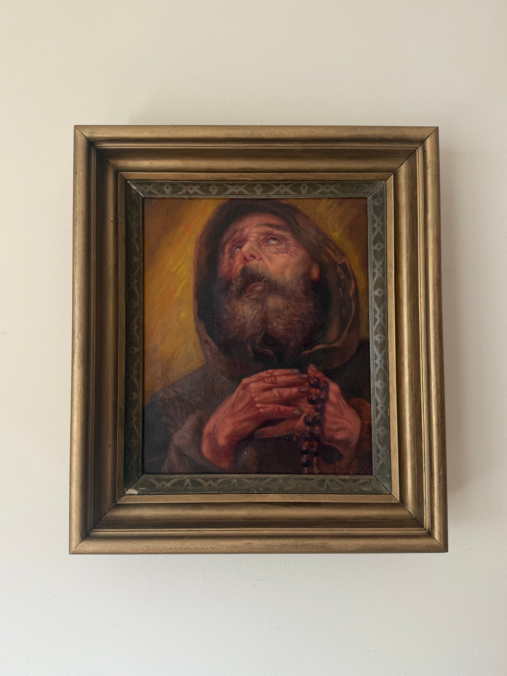 Saint Francis of Paola, an antique European devotional oil painting in a carved gilt wood frame